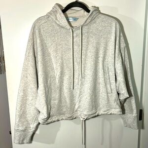 FLX crop gray hooded sweatshirt. Front pocket. Drawstring bottom. Size L